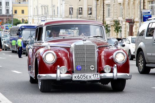 MOSCOW, RUSSIA - JUNE 2: German motor car Mercedes-Benz Type 300 competes at the annual L.U.C. Chopard Classic Weekend Rally on June 2, 2013 in Moscow, Russia.