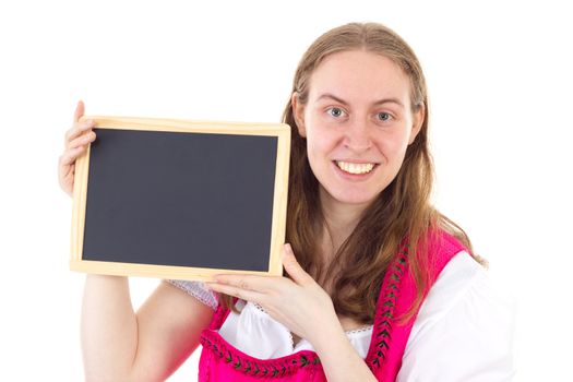 Beautiful woman in dirndl showing blank blackboard