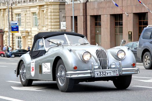MOSCOW, RUSSIA - JUNE 2: English motor car Jaguar XK150 competes at the annual L.U.C. Chopard Classic Weekend Rally on June 2, 2013 in Moscow, Russia.