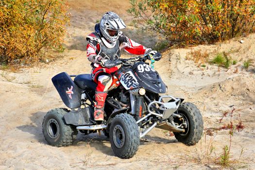 NOVYY URENGOY, RUSSIA - AUGUST 30: Undefined competitor's quad bike Yamaha No. 935 competes at the annual Russian Motocross Championship on August 30, 2012 in Novyy Urengoy, Russia.