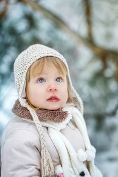 Cute little girl shot close-up on outdoors in winter