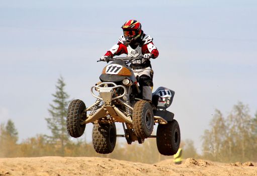 NOVYY URENGOY, RUSSIA - AUGUST 30: Undefined competitor's quad bike Yamaha No. 111 competes at the annual Russian Motocross Championship on August 30, 2012 in Novyy Urengoy, Russia.