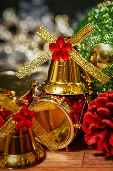 Festive Christmas golden bells photographed close-up background