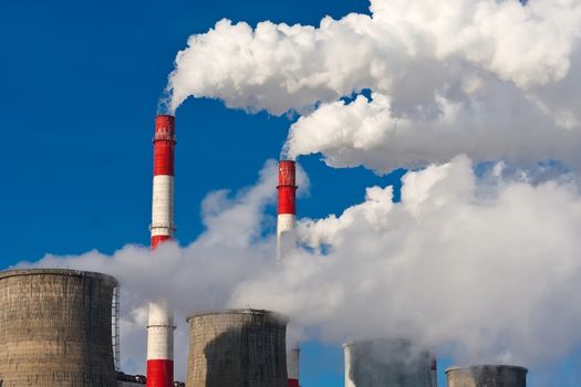 Industrial smoke rising from Power Station Cooling Towers