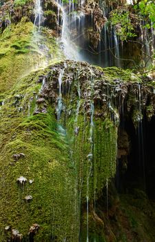 Waterfalls covered with green moss near Krushuna village, Nort Bulgaria, famous tourist destination