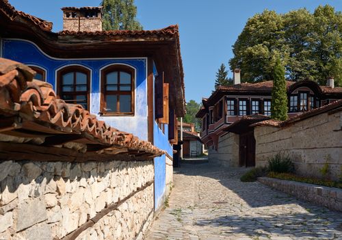 Street with traditional houses in Koprivshtitsa village, Bulgaria