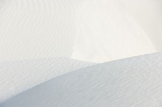 Ridges and waves on white quartz sand