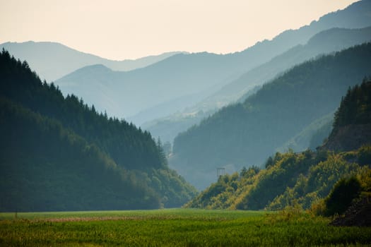 Slopes of Rhodope mountain, Bulgaria, at sunset in mid-summer