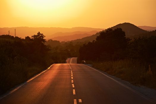 Road to the sunset in Sredna gora mountain, Bulgaria