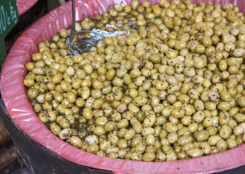 Traditional green olives for sale on Aix en Provence market, South France near Marseille city