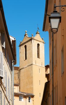 Typical Aix en Provence street view with ancient tower from XVI century and old houses