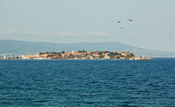 Peninsula of ancient Nessebar town in Bulgaria and blue water of the Black sea