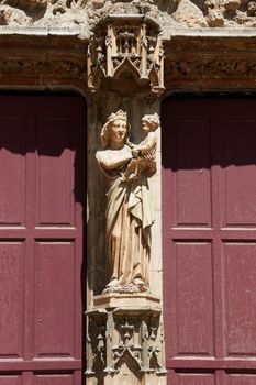 Holy Maru statue on facade of cathedral Saint-Sauveur in the ancient part of Aix en Provence town, South France