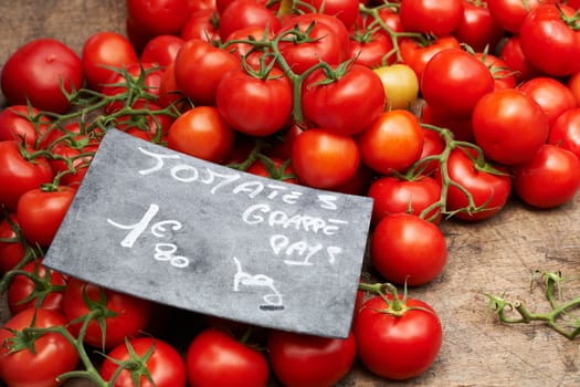 Ripe French tomatoes at Provence market in little town of South France