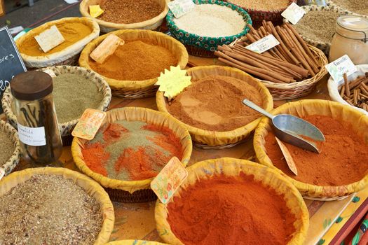 Random aromatic spices including paprica, curcuma and other for sale on Aix en Provence market, South France