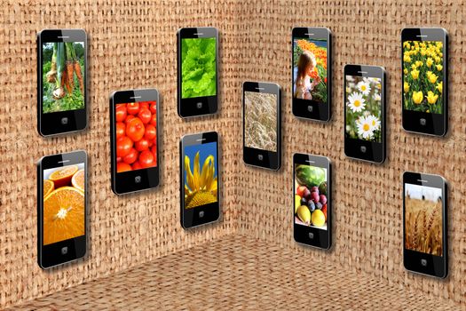Modern mobile phones with different images in three-dimensional flatness from sacking