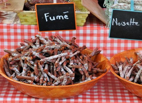 Home made smoked French saussage at market of Ain en Provence, France