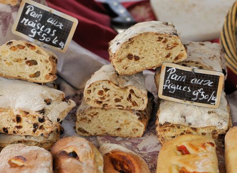 Traditional bread with grapes and figs at Provence market in France