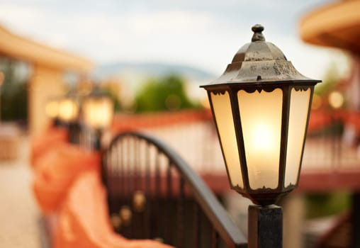 Town street with lantern at evening