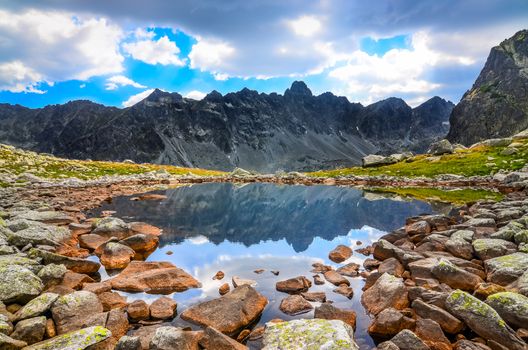 Scenic view of a mountain lake and rocks in High Tatras, Slovakia