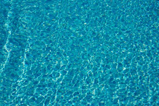 Clear blue water of a swimming pool