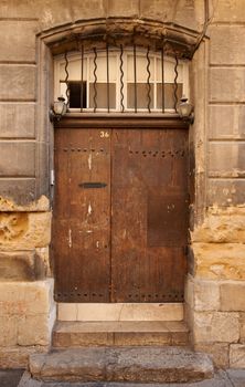 Old wooden door in Aix en Provence, France