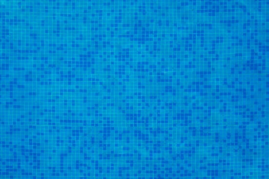 Blue tiles of a swimming pool bottom