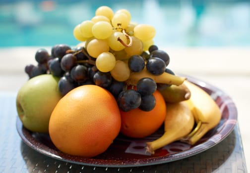 Fresh fruits and blue water