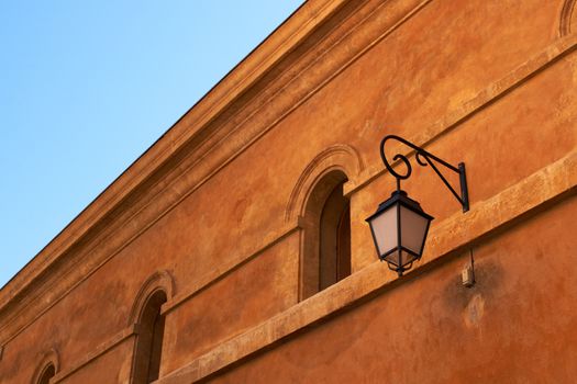 Facade with lantern in Aix en Provence, France