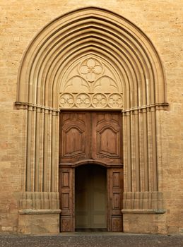 The gate of the cathedral in Cucuron, Provence, France