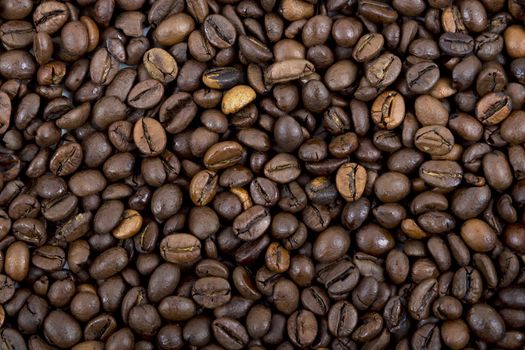 A lot of coffee beans, a background.