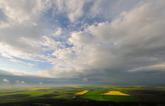 Spring panorama landscape with beautiful clouds