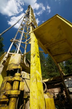 Russian ground drilling machine and blue sky