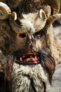 Kukeri traditional mask customs. Unique masquerade tradition from Bulgaria.