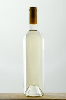 Sealed bottle of white wine without label