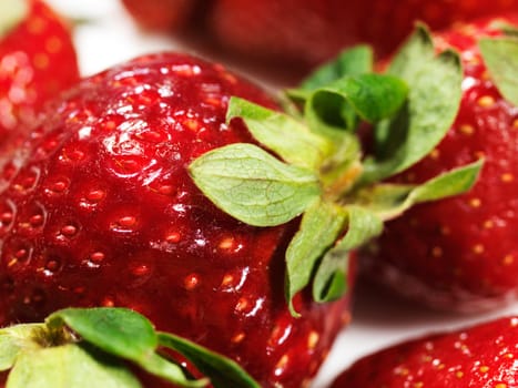 Close-up photo of a red ripe strawberry