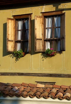 Window of a traditional Bulgarian house, home exterior