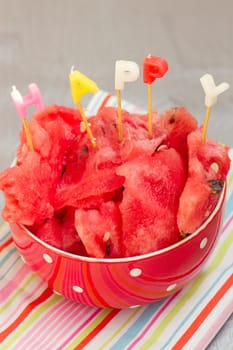 watermelon chunks in white bowl