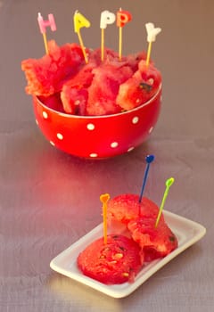 watermelon chunks in white bowl