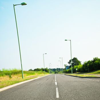 A modern road in rural England in summer