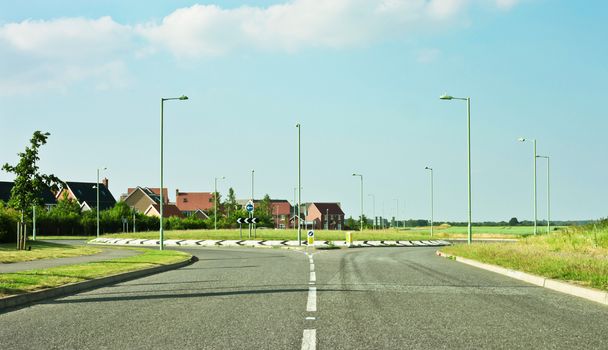 Modern road and roundabout in rural England