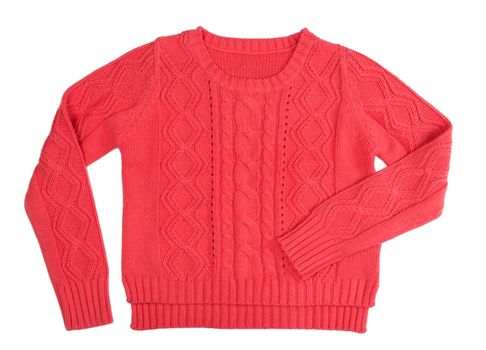 Warm red knitted sweater with a pattern. Isolate on white.