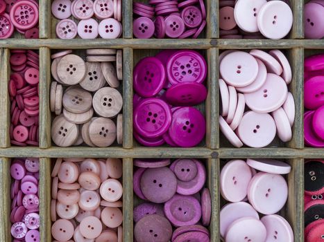 Drawer with colored buttons at an antiques market