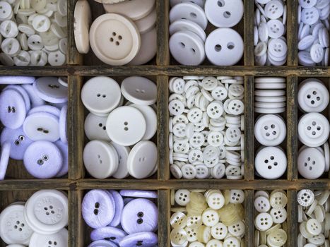 Drawer with colored buttons at an antiques market