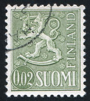 FINLAND - CIRCA 1954: stamp printed by Finland, shows Coat of arms of Finland, circa 1954