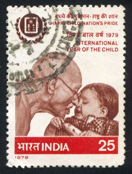 INDIA - CIRCA 1979: stamp printed by India, shows Mahatma Gandhi and child, circa 1979