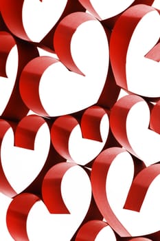 Red ribbon hearts decoration on white background