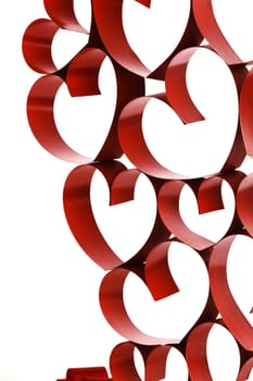 Red ribbon hearts decoration on white background