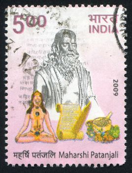 INDIA - CIRCA 2009: stamp printed by India, shows Maharshi Patanjali statue, scroll, circa 2009