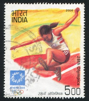 INDIA - CIRCA 2004: stamp printed by India, shows long jump sportsman at Games of the XXVIII Olympiad, circa 2004